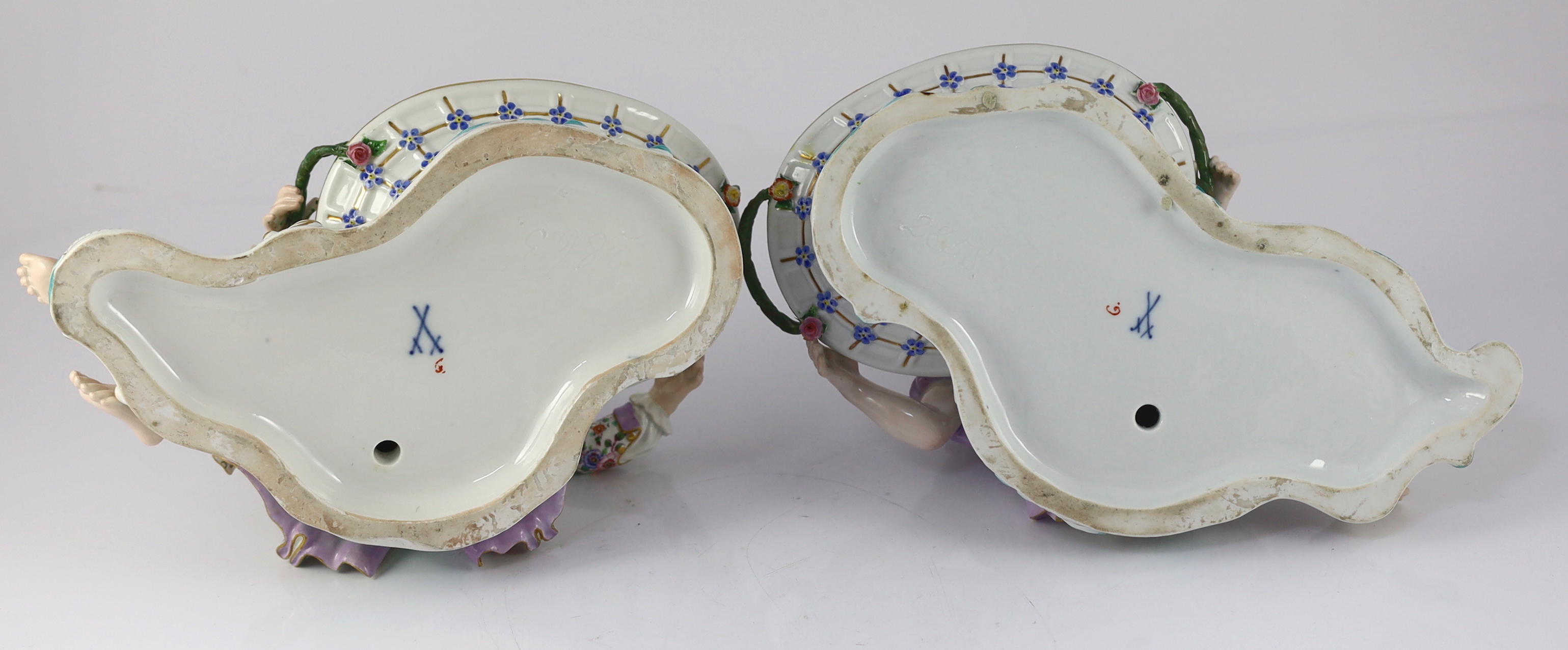 A pair of large Meissen figural bonbon dishes, 19th century